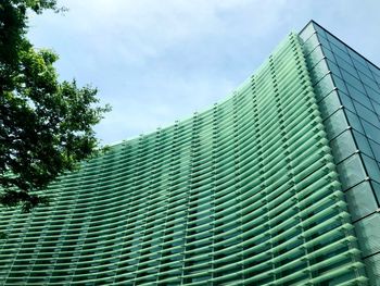 Low angle view of modern building against sky