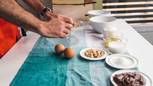 Close-up of man having breakfast