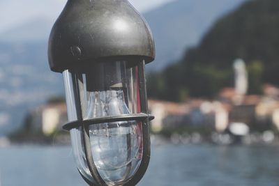 Close-up of light bulb against blurred background