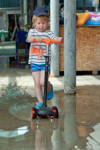 Portrait of boy playing in gym