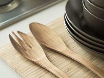 Close-up of wooden spoon and fork