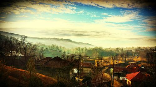 View of city against cloudy sky