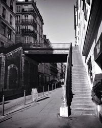 Alley amidst buildings in city