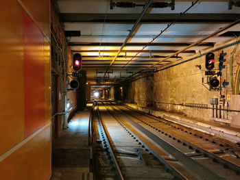 Train in illuminated subway station