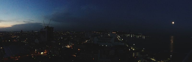 Illuminated cityscape at night