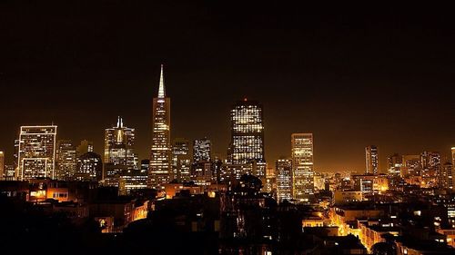 Illuminated cityscape at night