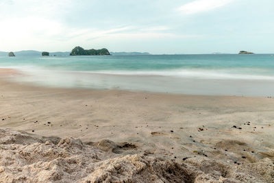 Scenic view of beach against sky