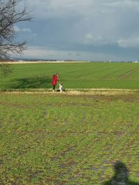 Scenic view of field against sky