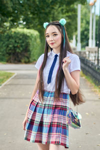 Asian high school girl on a walk.