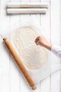 High angle view of person preparing food on table