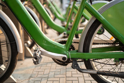 Close-up of bicycle parked on field