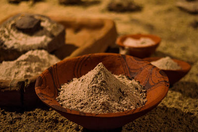 Close up spices in old clay bowls concept photo