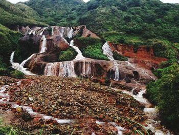 View of waterfall in forest