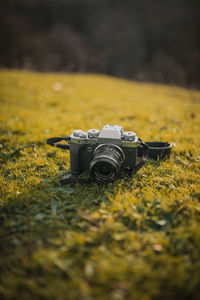 Close-up of camera on field