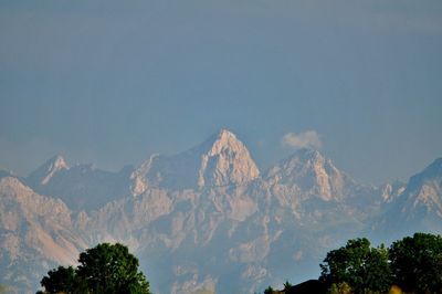 Low angle view of mountains against clear sky