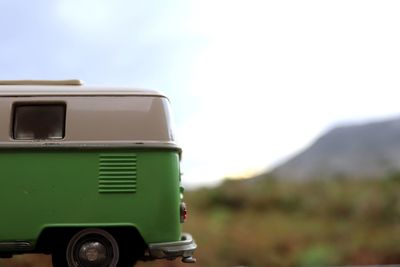 Close-up of vintage car on land