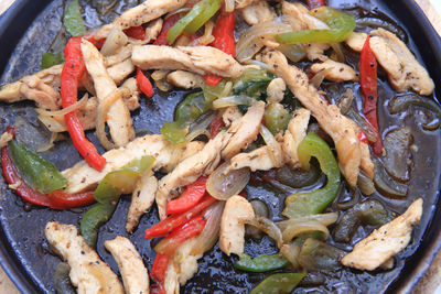 Close-up of chopped vegetables in cooking pan