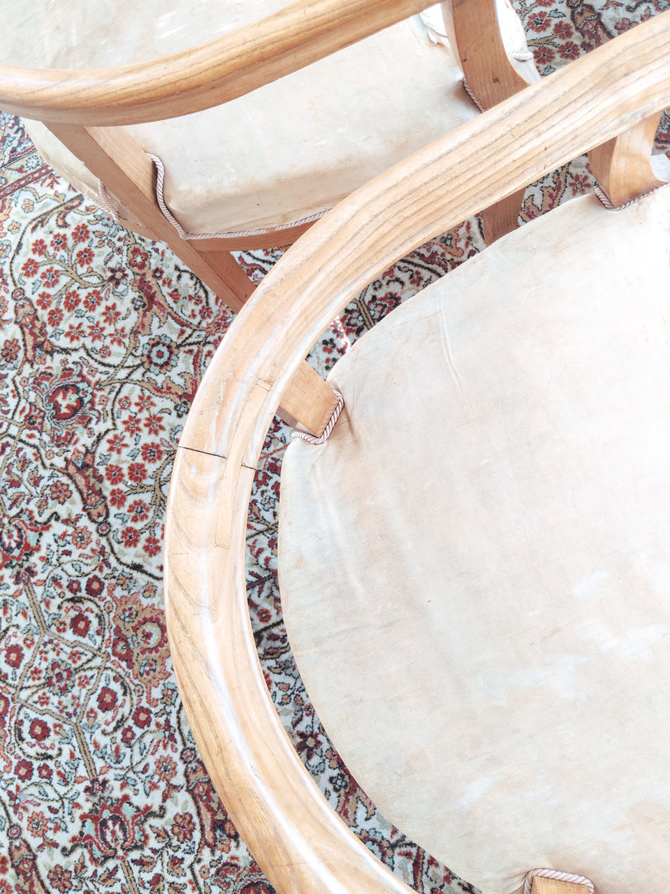 HIGH ANGLE VIEW OF TILED FLOOR AND TABLE