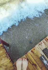 Human feet in water