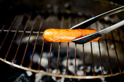 Close-up of meat on barbecue grill