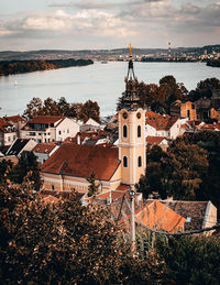 High angle view of townscape by buildings against sky