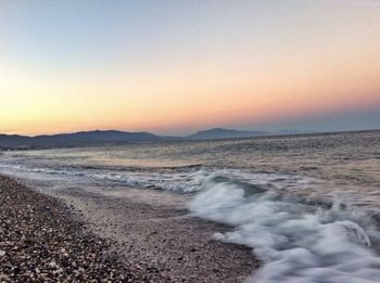 Scenic view of sea at sunset