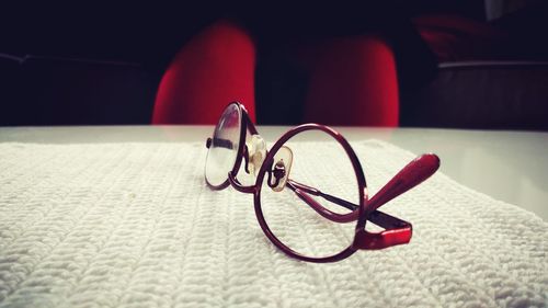 Close-up of eyeglasses on table at home