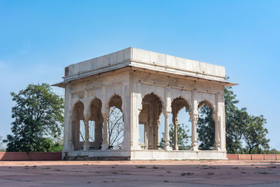 View of historical building against clear blue sky