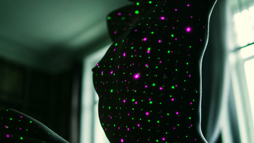 Close-up of illuminated lighting equipment at home