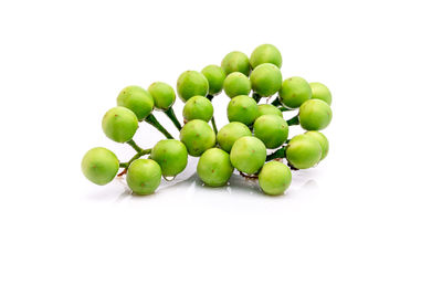 High angle view of grapes over white background