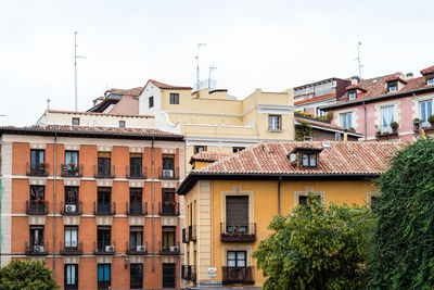 Low angle view of residential buildings against sky