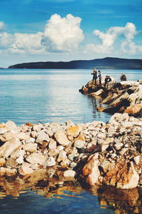 Scenic view of sea against cloudy sky