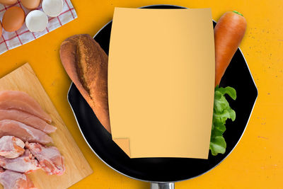 High angle view of bread in plate on table