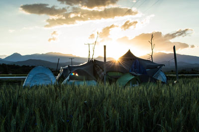 Scenic view of landscape at sunset