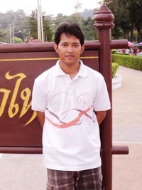 Portrait of young man standing outdoors