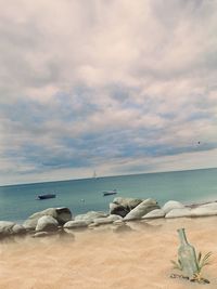 Scenic view of beach against sky