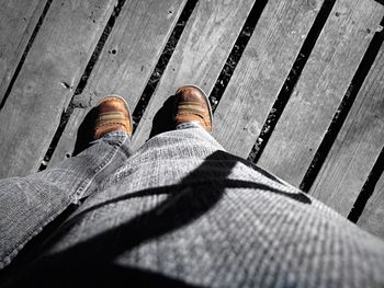 Low section of woman on tiled floor