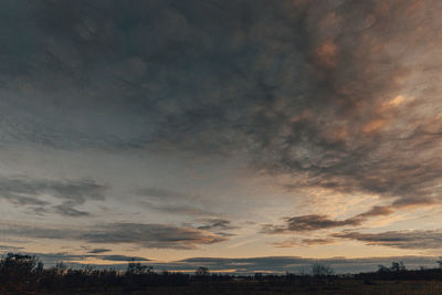 Scenic view of dramatic sky during sunset