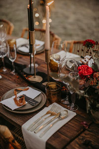 Close-up of wine glasses on table