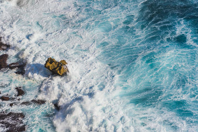 High angle view of waves in sea