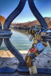 Close-up of love locks on railing