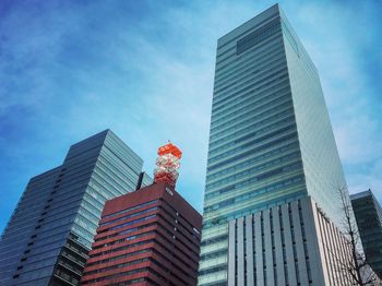 Low angle view of modern buildings against sky