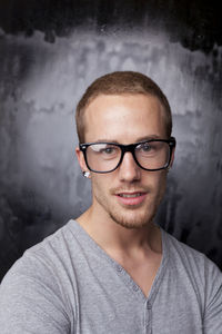 Portrait of young man wearing eyeglasses