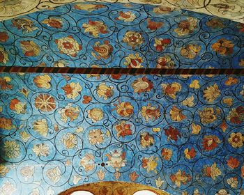 Close-up of blue pattern on tiled floor