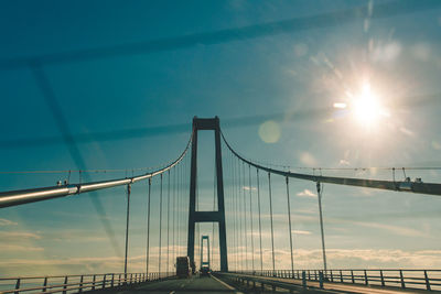 View of suspension bridge against sky during sunset