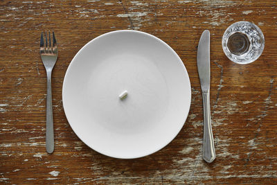 High angle view of empty plate on table