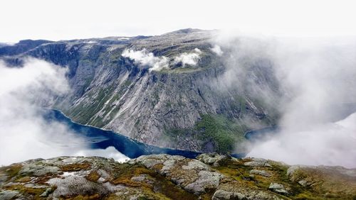 Scenic view of volcanic mountain against sky