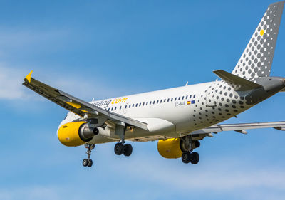 Low angle view of airplane flying in sky