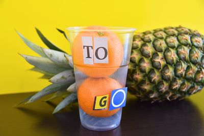 Close-up of lemon slice on table