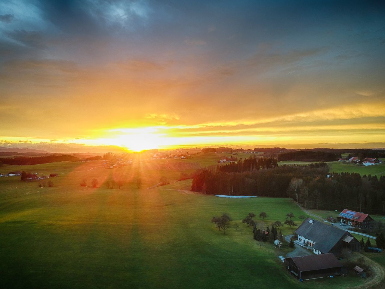 SCENIC VIEW OF LANDSCAPE AGAINST SUNSET SKY